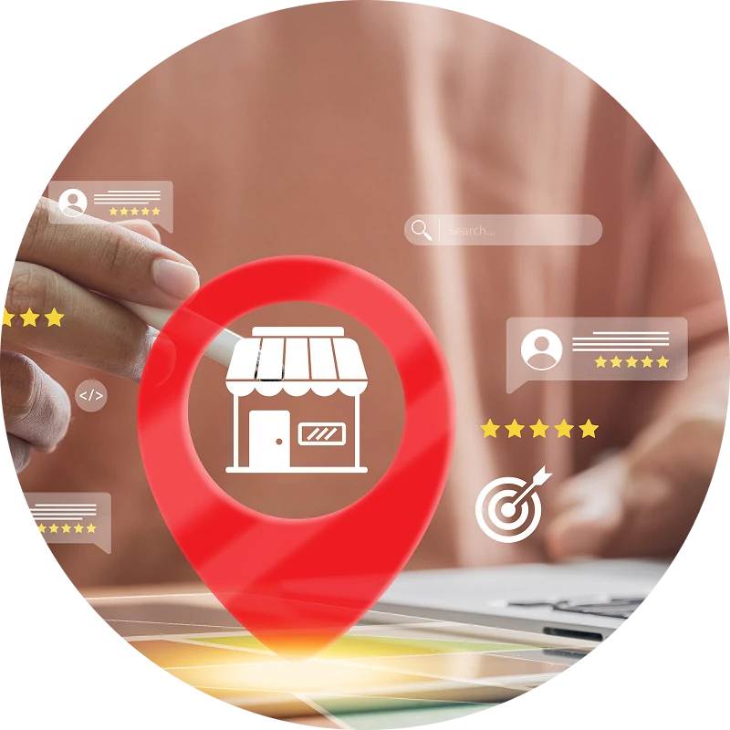 Close-up of hands using a pen and laptop, overlaid with a large red location pin containing a storefront icon, plus floating search, star-rating, and target icons—suggesting local business marketing.